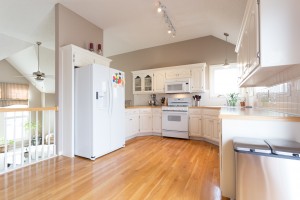 photo of a white kitchen in a split level home